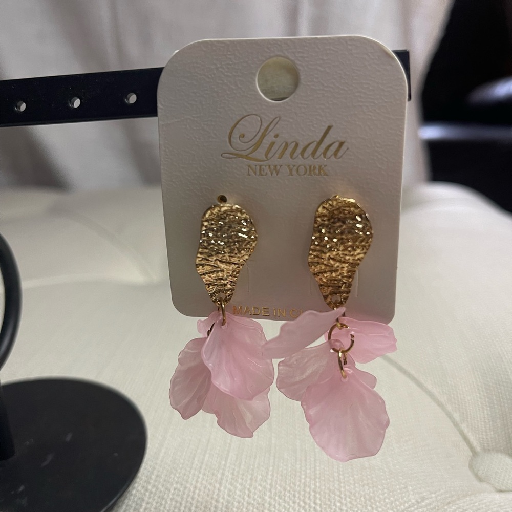 Pink shell earrings with gold accents